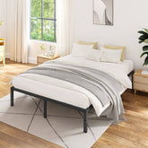 A simple bed featuring a sturdy metal frame and a smooth white bedspread, creating a clean and inviting look.